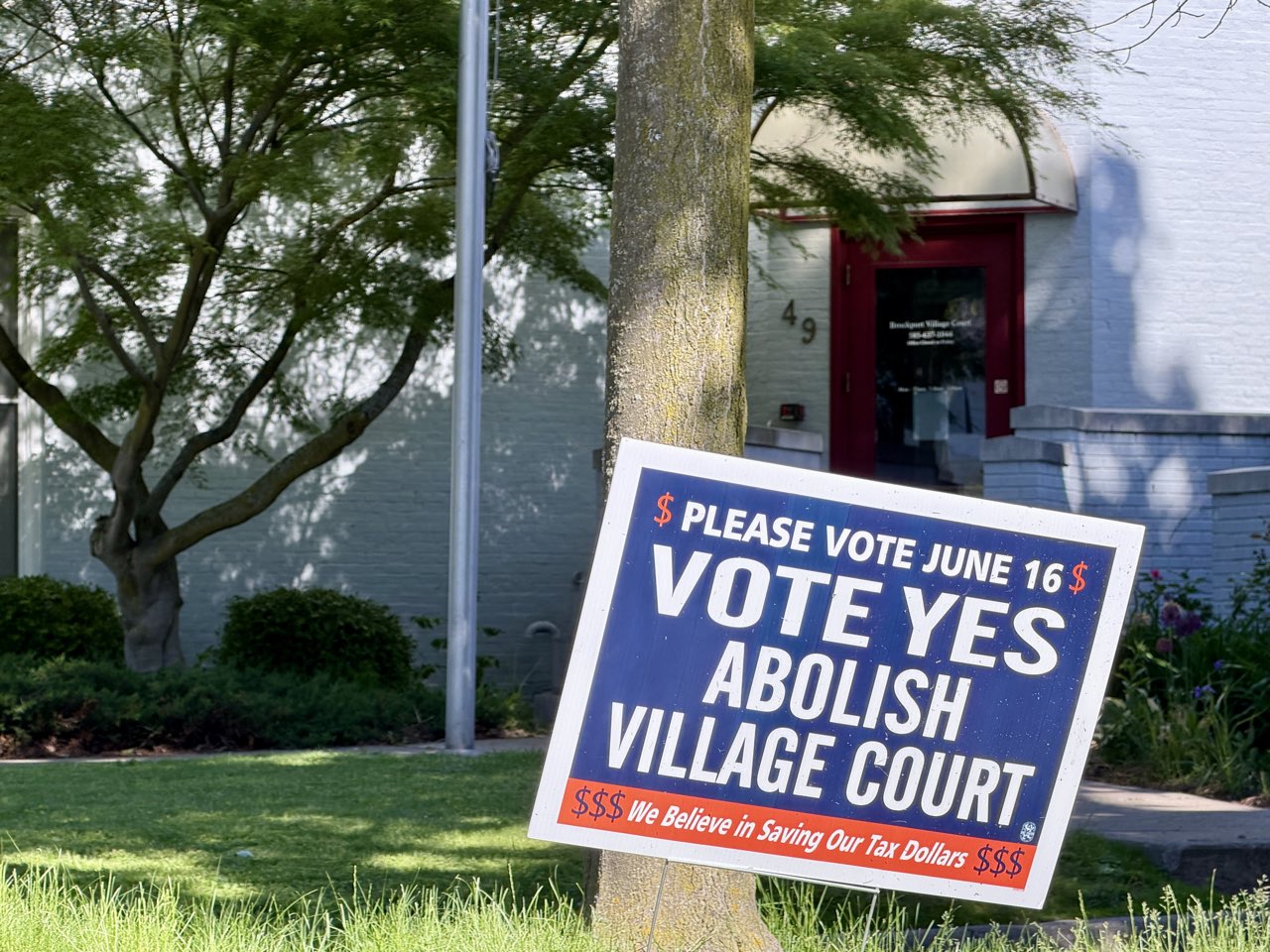 The Vote Yes lawn sign planted outside the Brockport Village Municipal Building at 49 State Street, the June 16 polling place